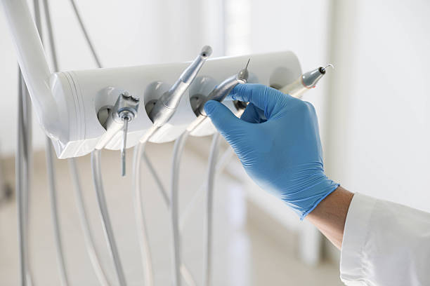 Professional Tooth Extraction technician working in Marion County County, AR